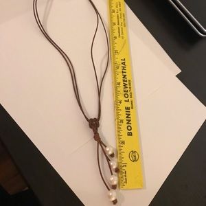 Pearl Couture leather with 4 pearls necklace.